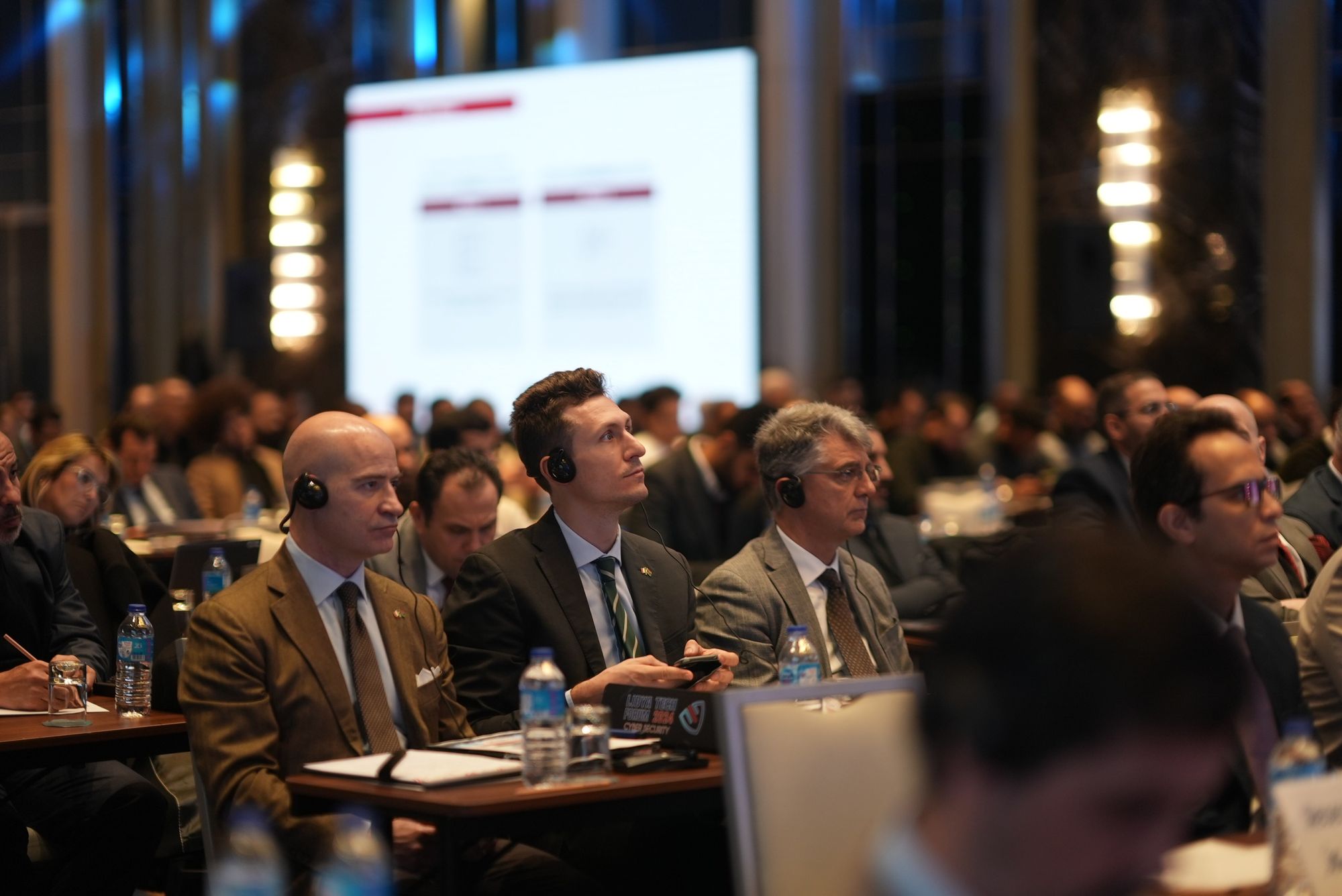 Audience listening with translation headsets